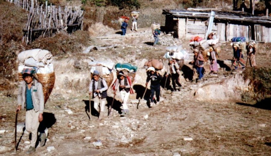 Train of porters carrying trade goods to Namche Bazaar