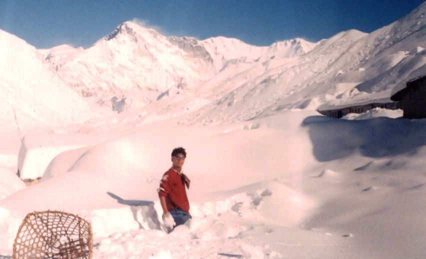 Nima excavating tent in Gokyo Village after snowstorm