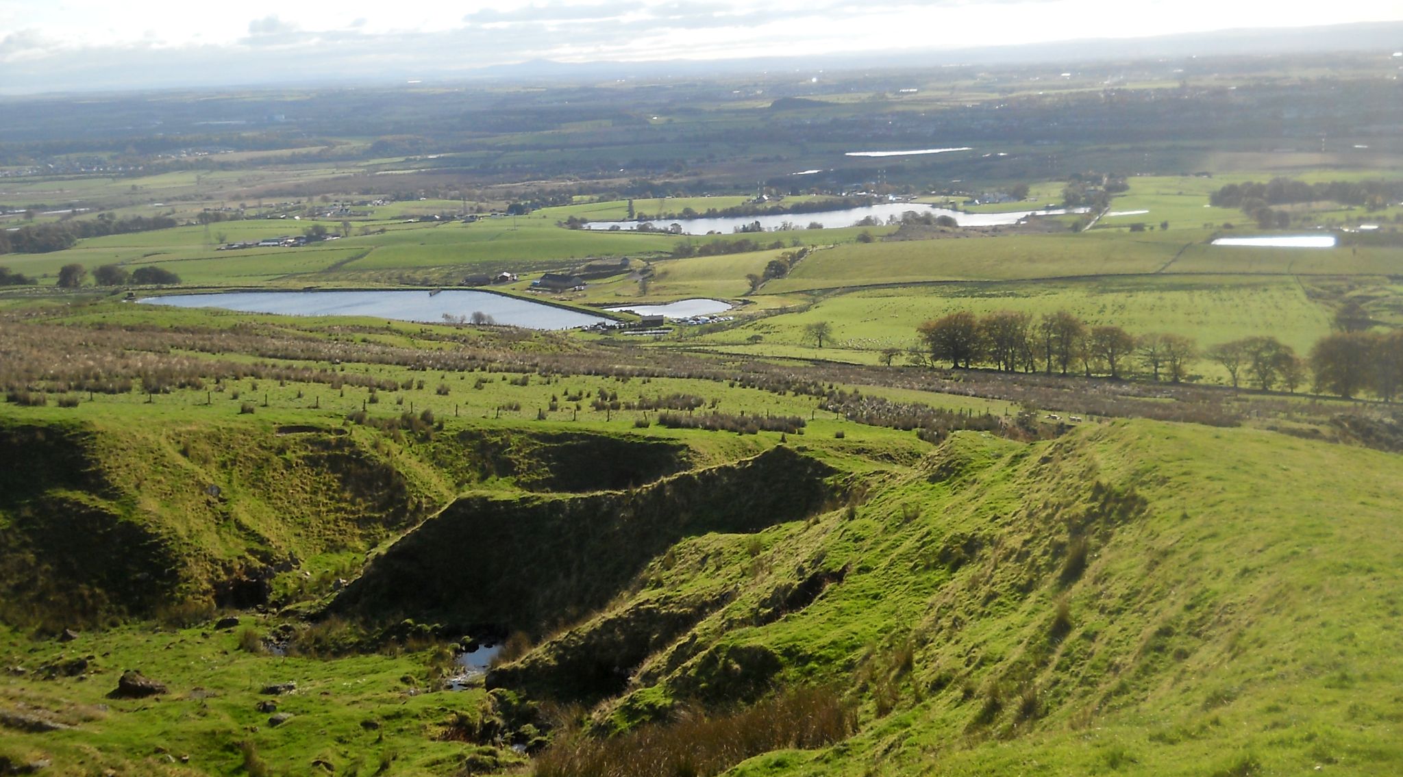 Woodburn Reservoir Trout Fishery and Antermoney Loch on ascent to Brown Hill